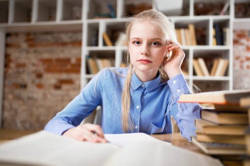 Beautiful Blond Girl Studying